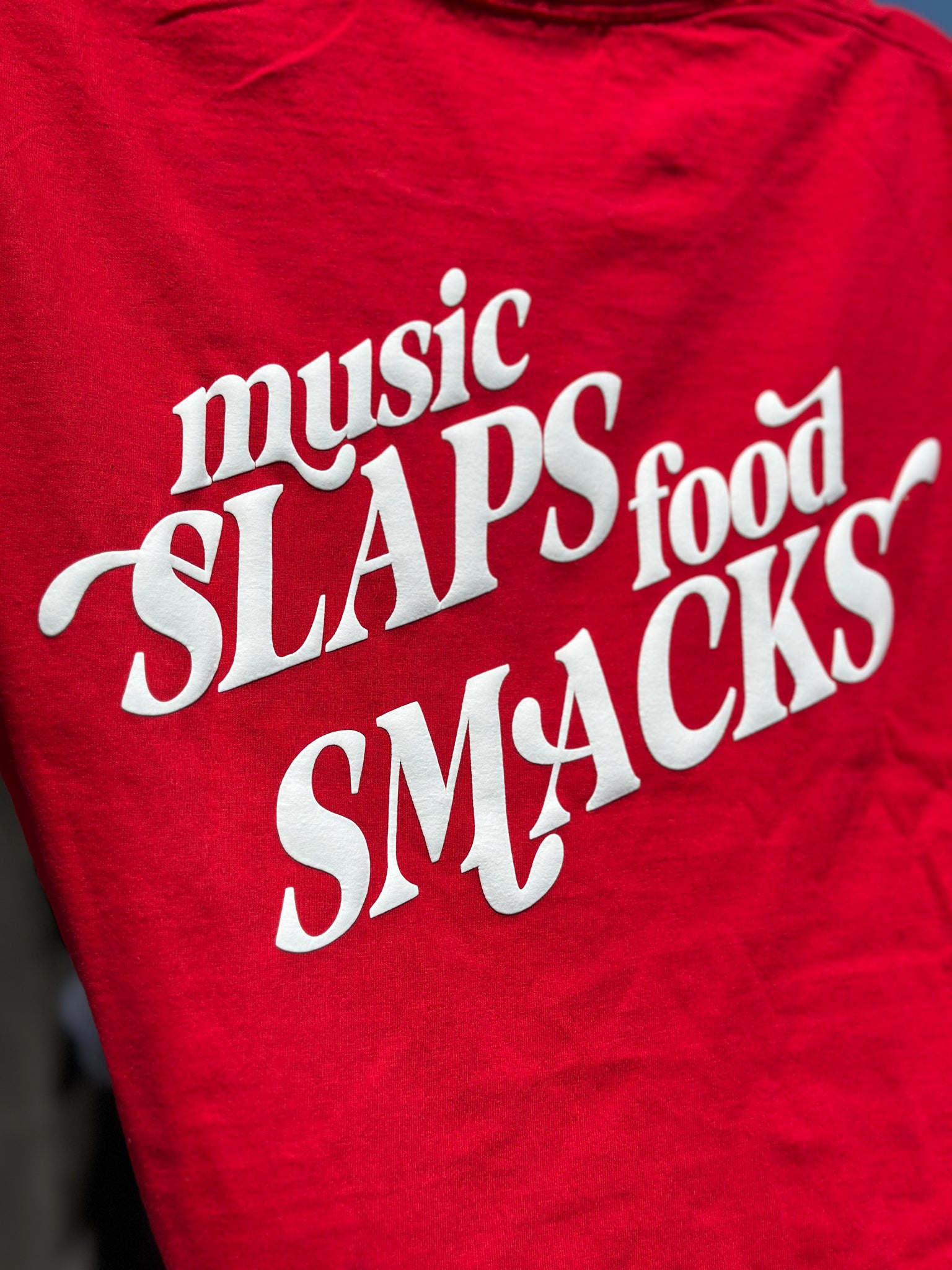 music SLAPS food SMACKS Tee